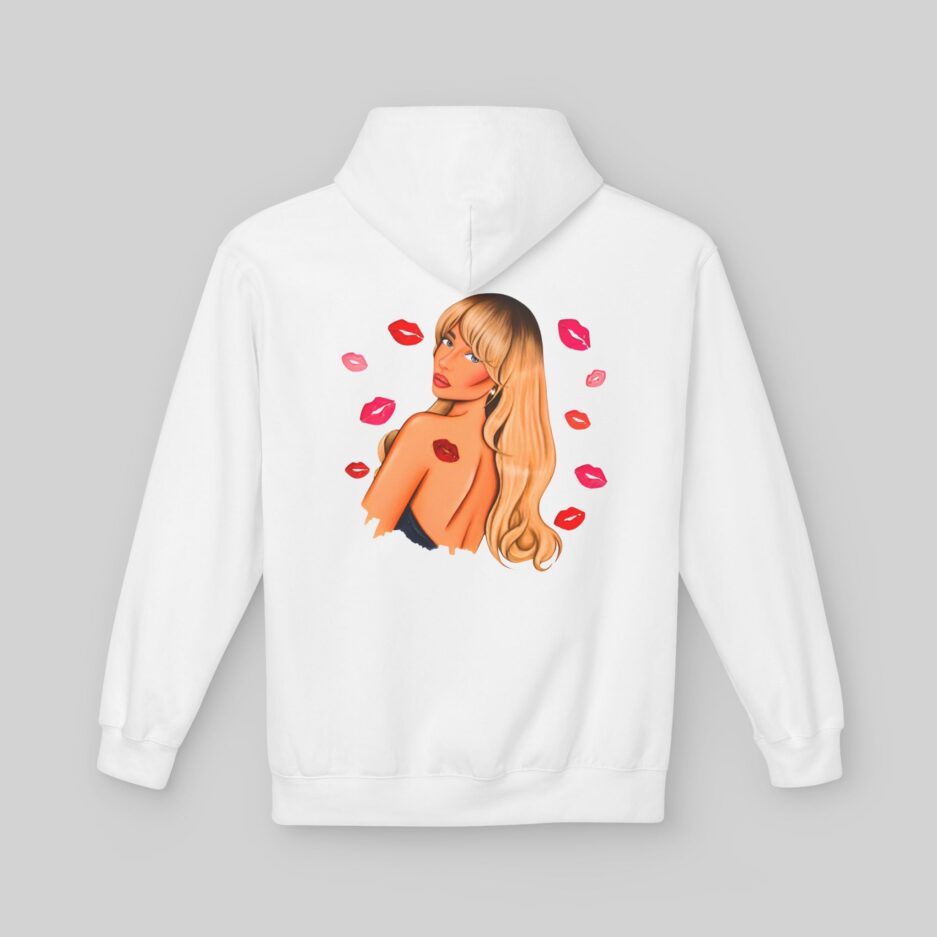 White Sabrina Carpenter Fall in Love Hoodie with a graphic of a woman with long hair and red lips on the back, on a gray background.