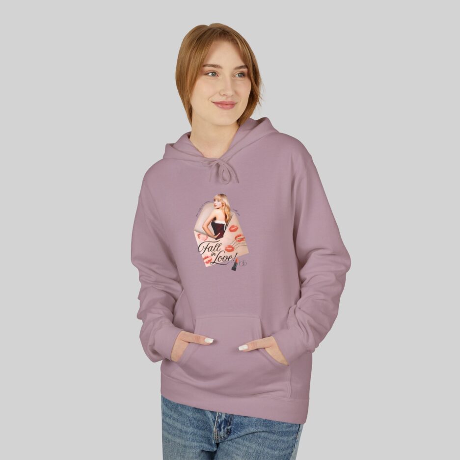 Person wearing a purple Sabrina Carpenter Fall in Love Hoodie with a graphic design on a plain background