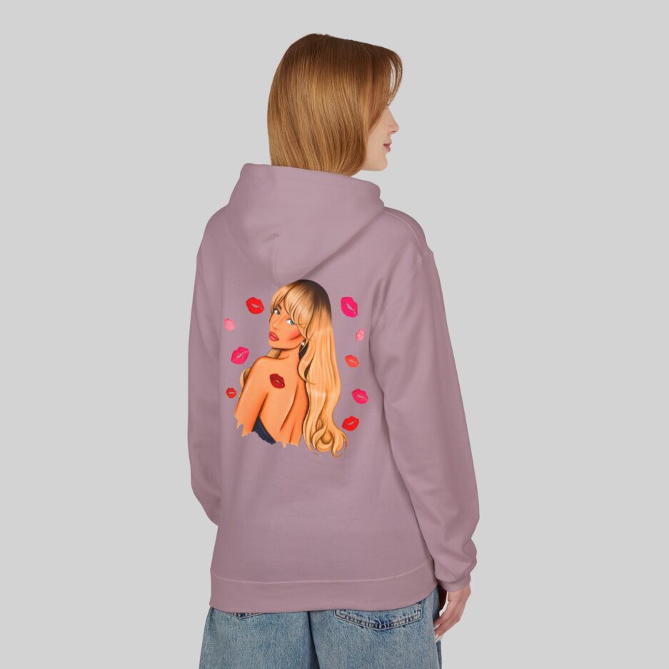 Person wearing a purple Sabrina Carpenter Fall in Love Hoodie with a graphic design on the back against a plain background