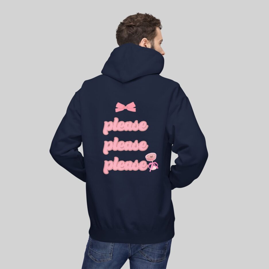 Person wearing a navy Sabrina Carpenter Lover Hoodie with pink text and graphics on the back against a gray background