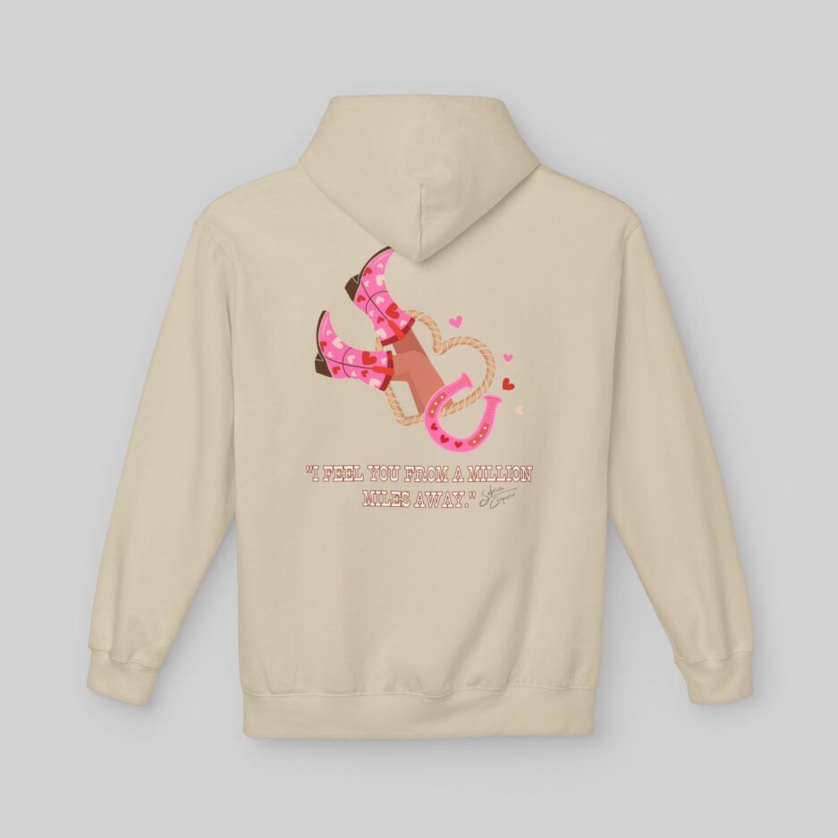 Beige Sabrina Carpenter Romantic Message Hoodie with pink boot design on the back against a light gray background