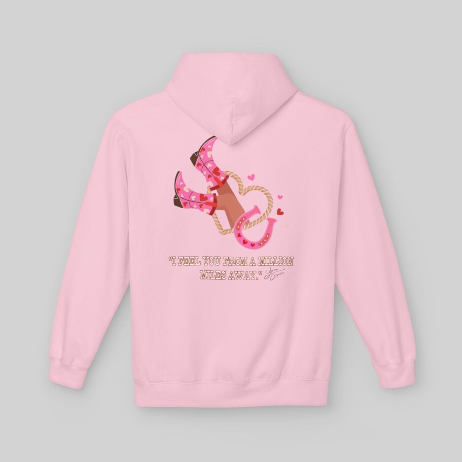 Pink Sabrina Carpenter Romantic Message Hoodie with cowboy boots and text on the back against a gray background