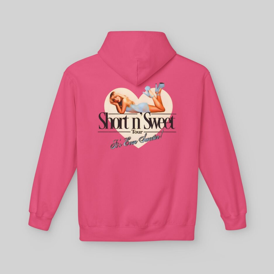 Pink Sabrina Carpenter Short n’ Sweet Hoodie with graphic design on the back against a gray background