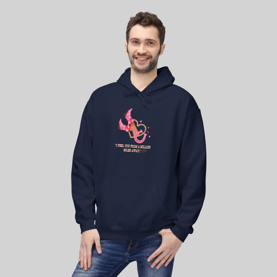 Man wearing a navy blue Sabrina Carpenter Valentine's Day Hoodie with a graphic design on a gray background